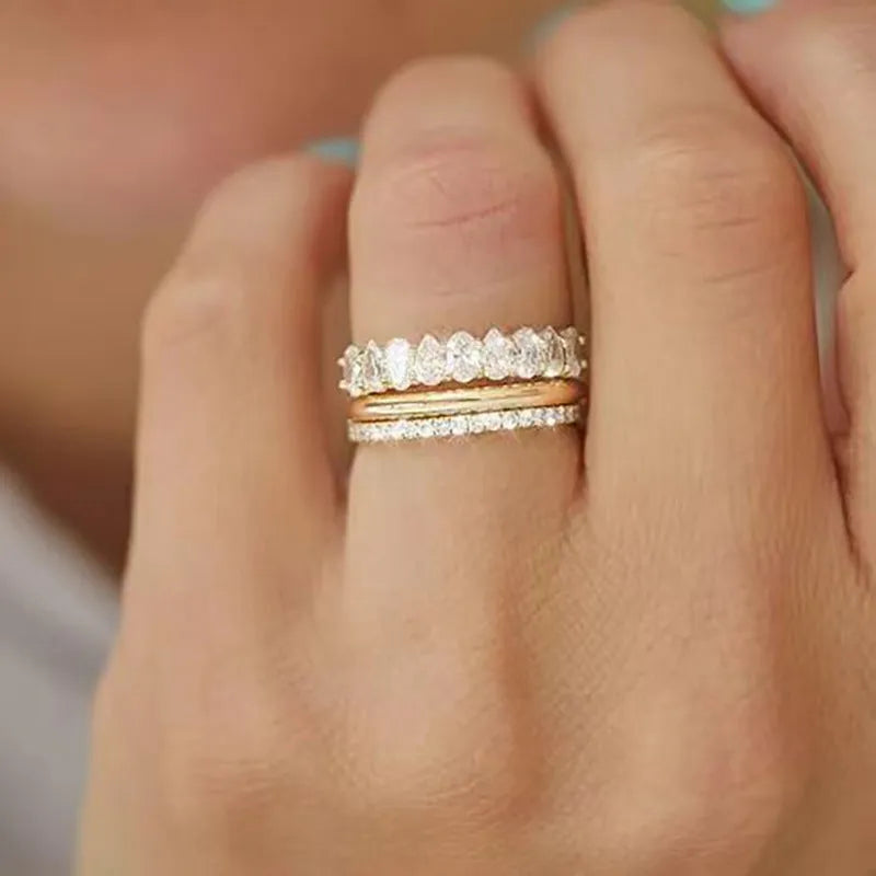 Geometric zircon three-piece ring set in white gold or yellow gold colour, sizes 6 to 10, copper band