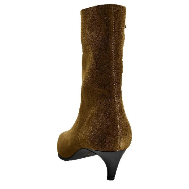 Brown square toe ankle boots with a side zip and a low kitten heel on a waterproof platform.