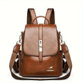 Ladies PU backpack in black or dark brown with large capacity, sandwich pocket, and commuter design