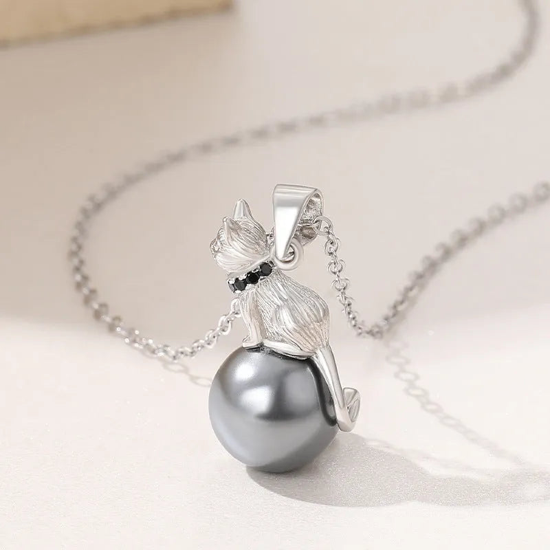 925 sterling silver cat pendant necklace on a chain, showing elegant feline design.