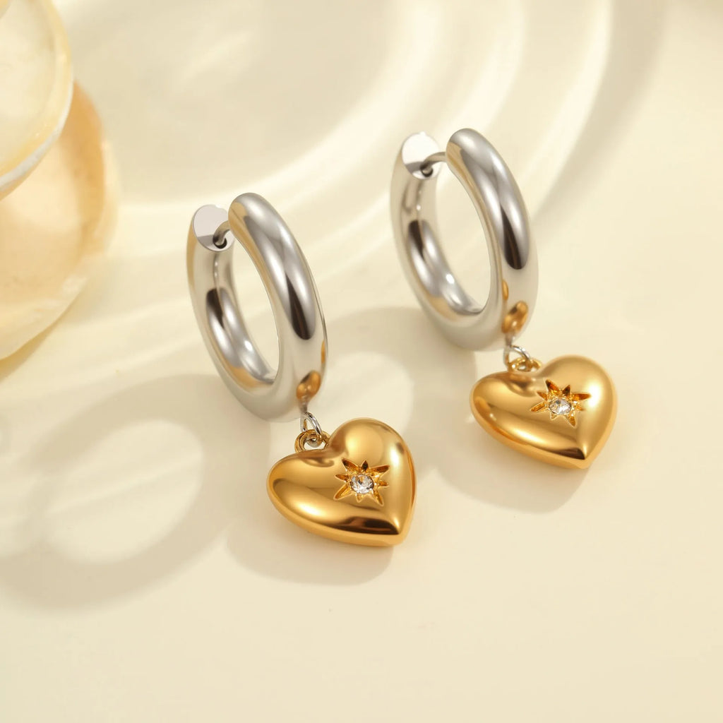 Christmas tree shaped heart earrings with star motifs in gold electroplated stainless steel
