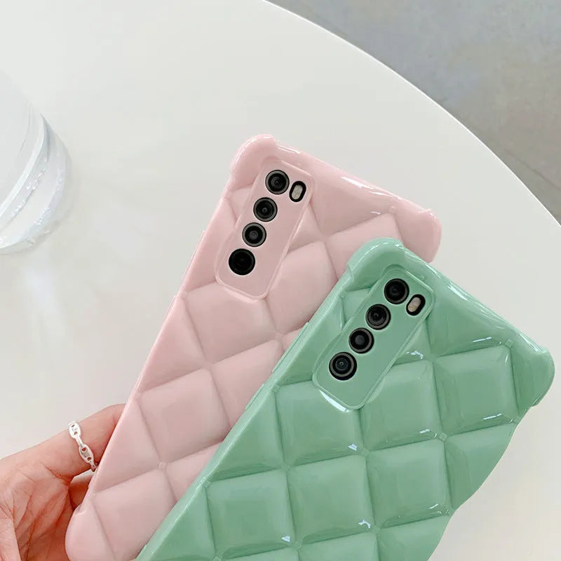Black silicone diamond texture phone case for Huawei P40 Pro on a table.