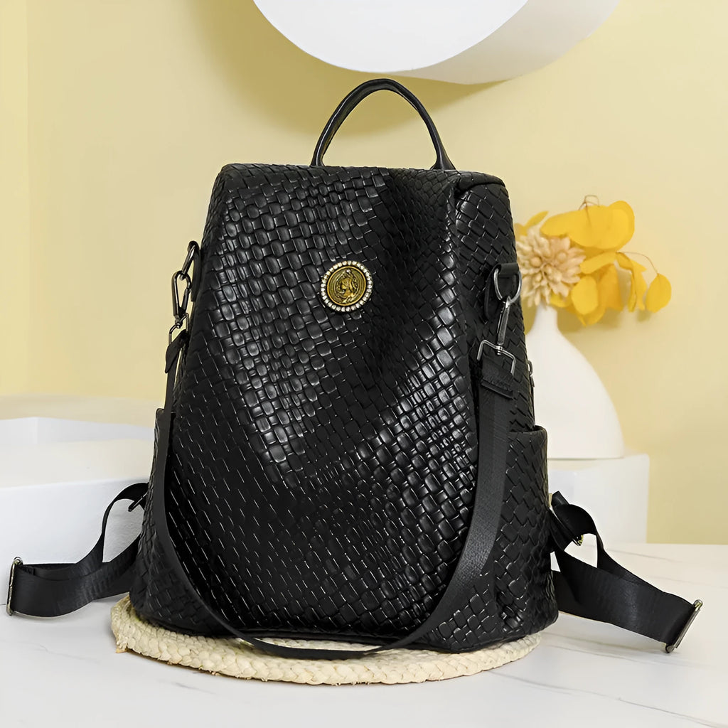 Women's black anti-theft backpack with waterproof PU material and internal organisation compartments