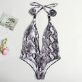 Women's leopard print one-piece swimsuit with buckle bandage design and backless style