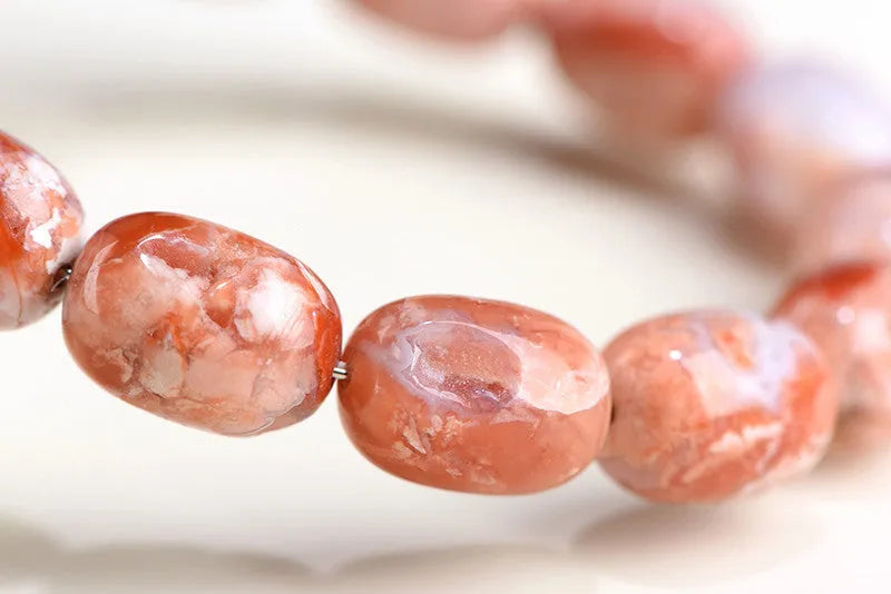 Natural cherry agate barrel bead bracelet with Ruyi elements and 10x14mm beads