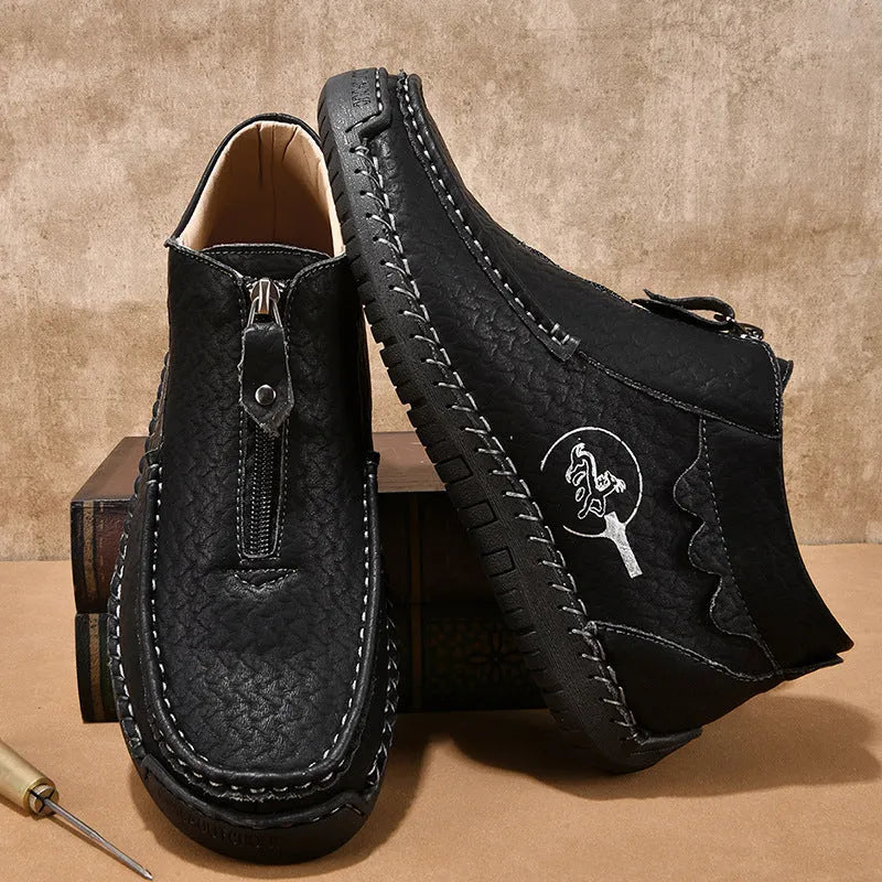 Men's black slip-on casual loafers with a round toe and rubber sole on a white background.