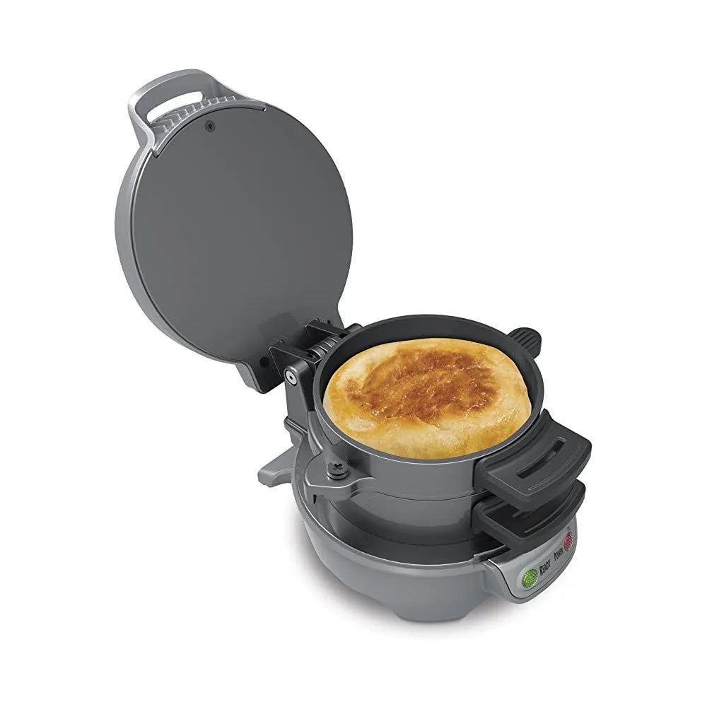 Bright red multifunction breakfast machine with sandwich press and egg cooker ring on baking tray