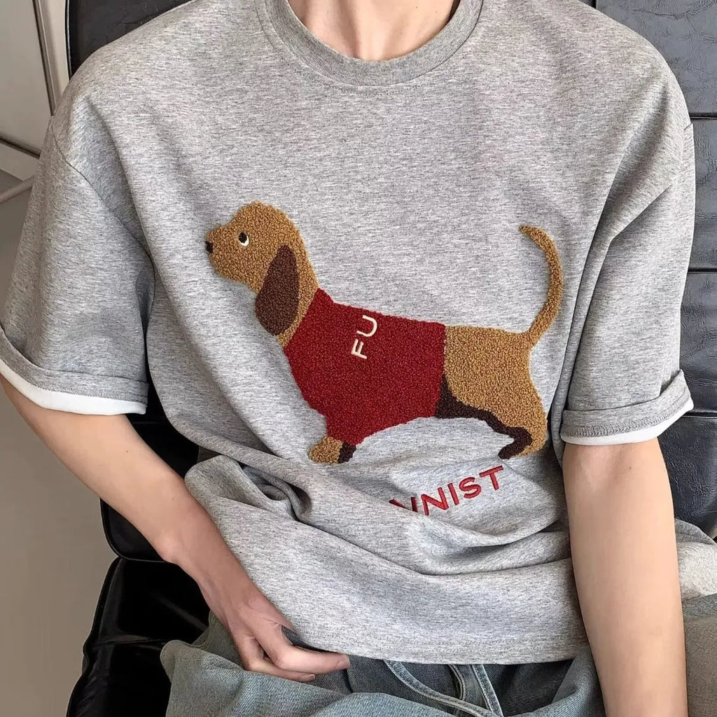Men's grey cotton T-shirt with embroidered sausage dog design on front, short sleeves and round neck