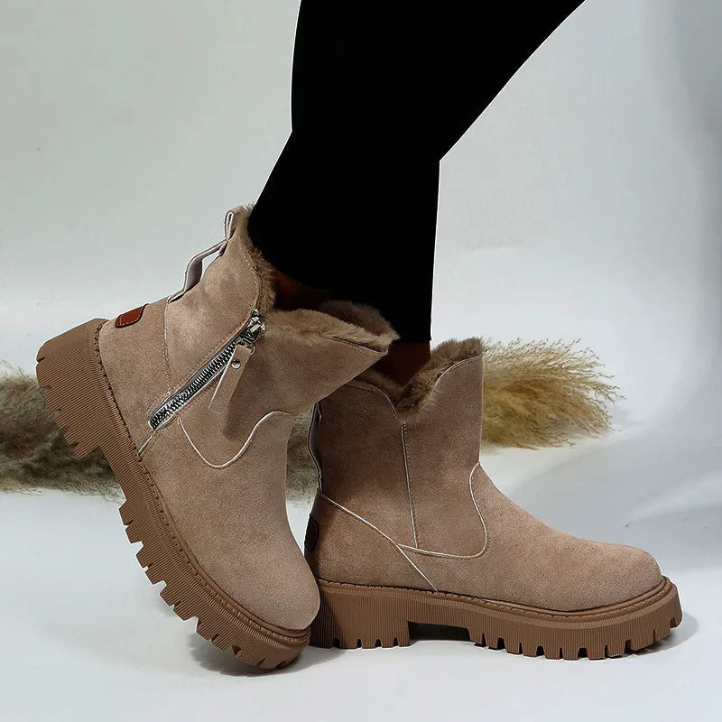 Women's black high-top snow boots with side zipper and faux fur lining shown alongside khaki colour option