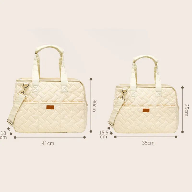 Grey pet carrier handbag with mesh panels and a safety cord, shown next to a white version.