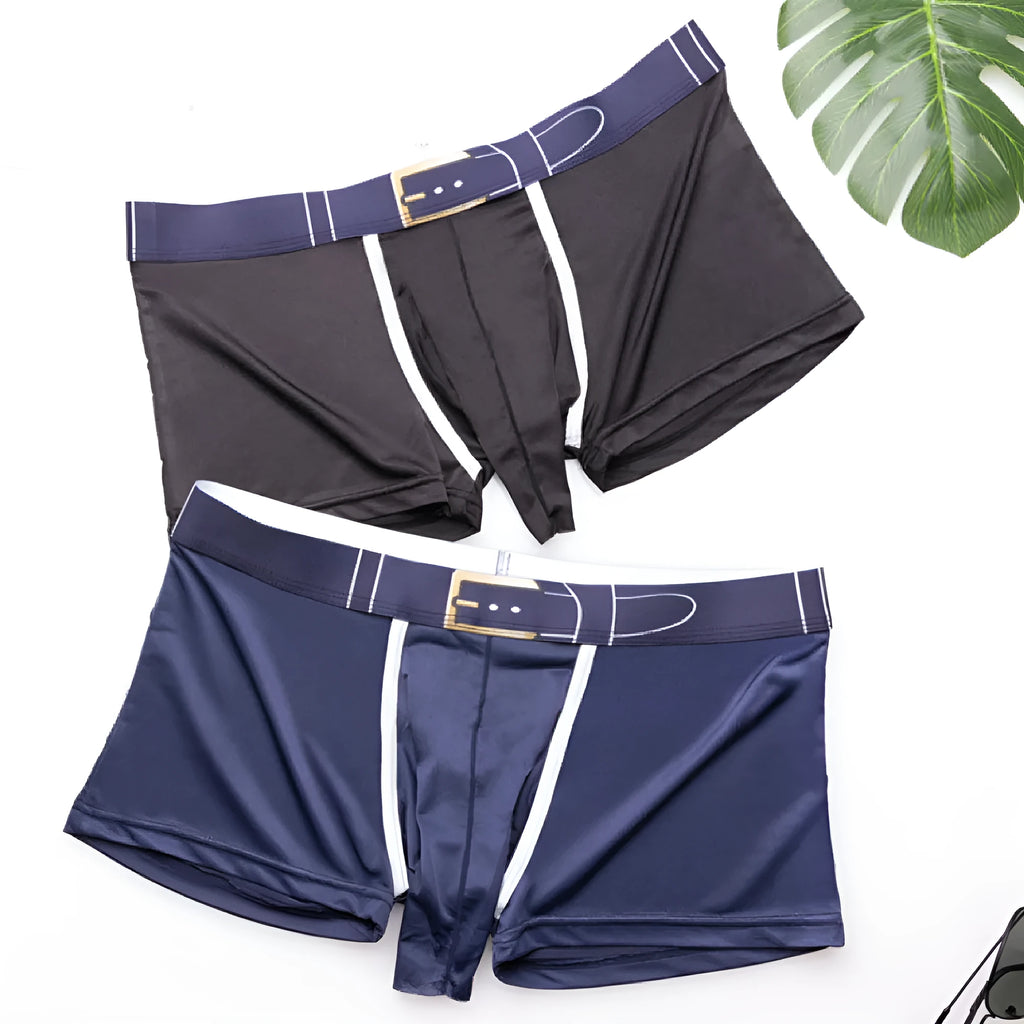 Men's solid colour ice silk boxer shorts in blue, showing mid waist design on a grey background.