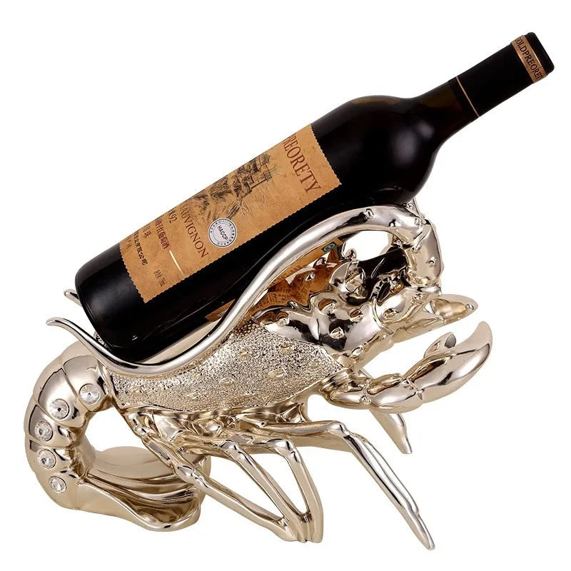 Resin lobster-shaped wine rack ornament in metallic finish holding wine bottle