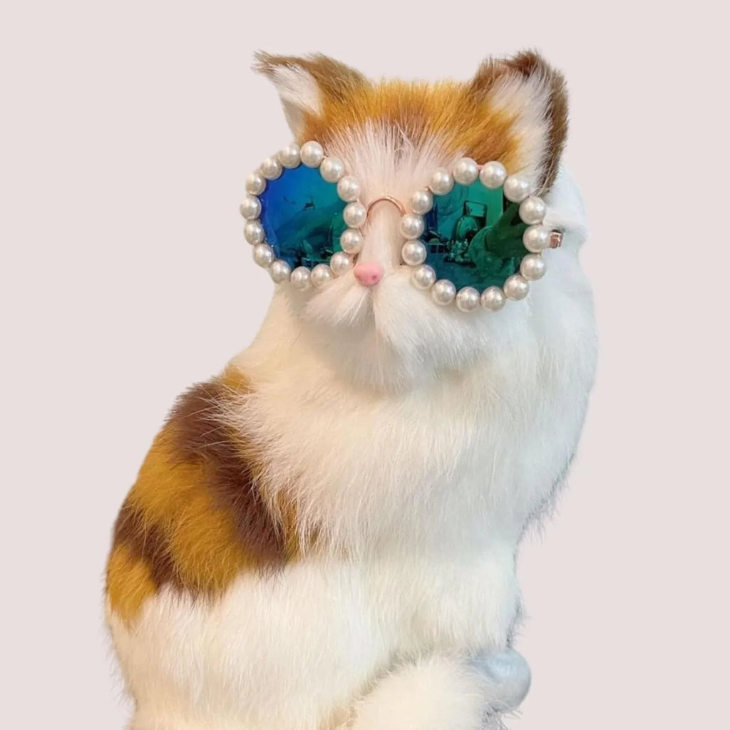 Round pearl-rimmed sunglasses for a dog or cat costume, shown in multiple colours.