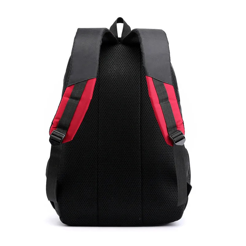 Waterproof nylon student backpack with airpillow straps available in black, red, blue, and grey colours