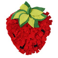 Red and green strawberry-shaped pet slow feeder mat with textured hiding spots