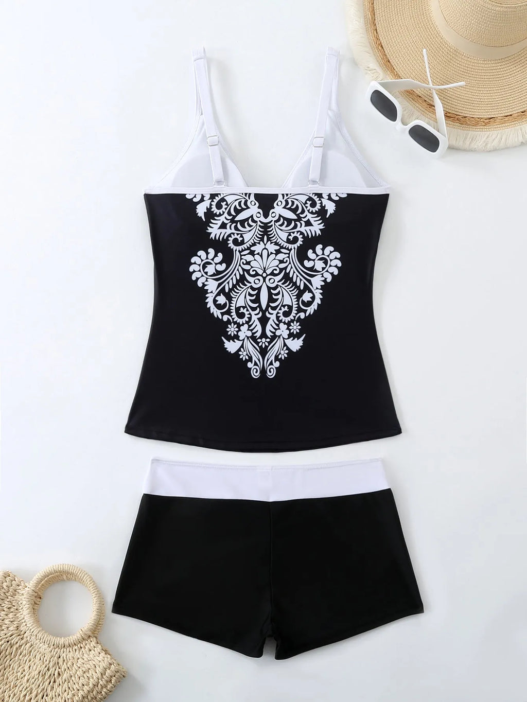Women's plus size two-piece swimsuit in black or rose red, with briefs bottom.