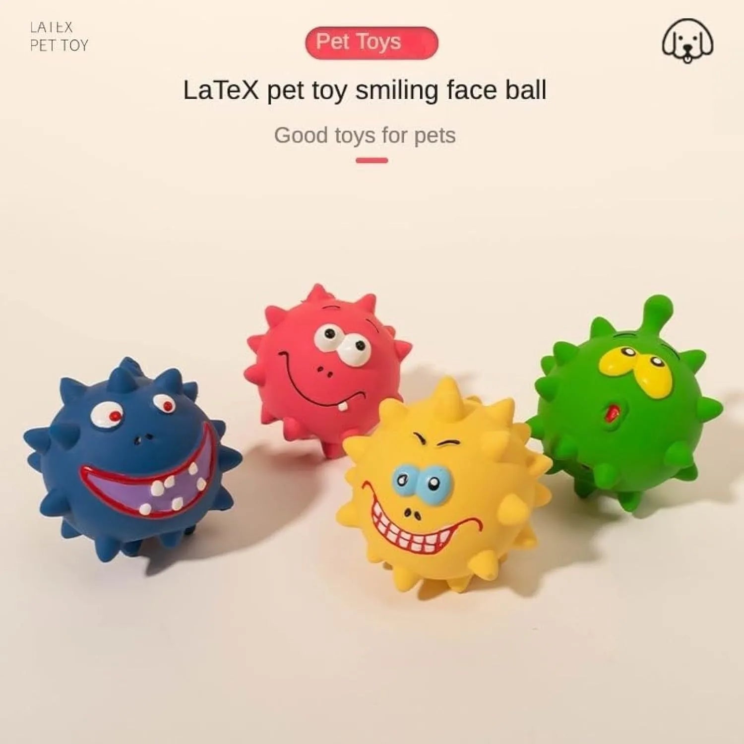 Set of four colourful squeaky latex dog balls with cute faces, shown next to a dog.