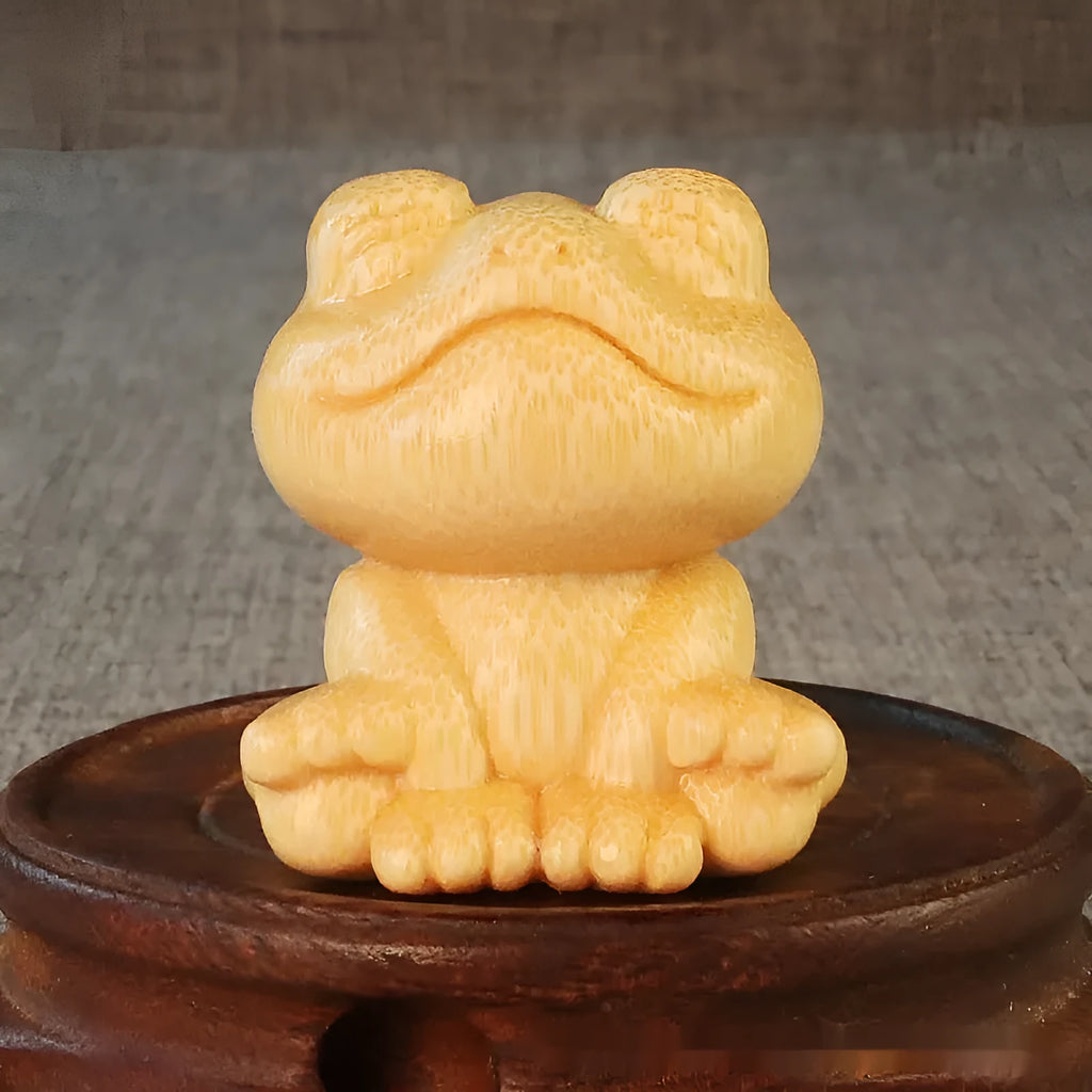 Solid bamboo carving ornament with smiling frog design measuring 5cm tall