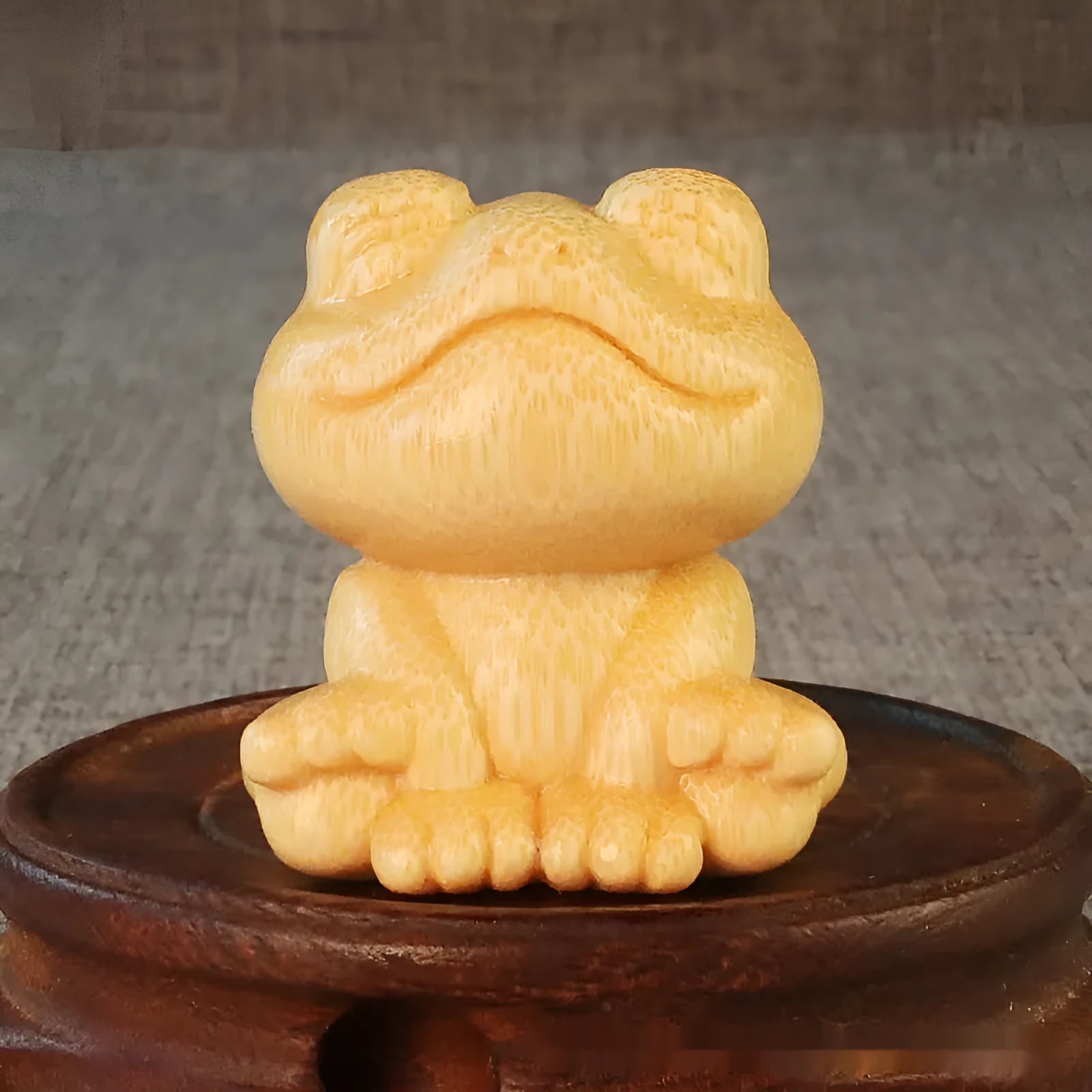 Solid bamboo carving ornament with smiling frog design measuring 5cm tall