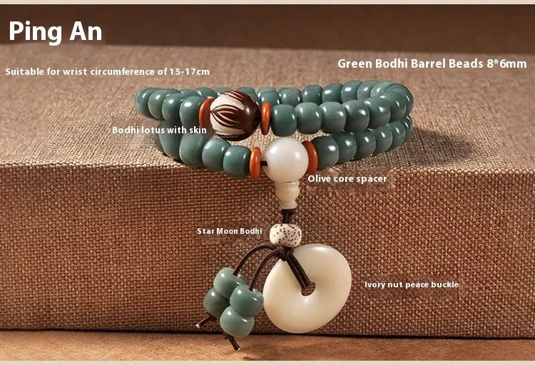Bodhi seed beaded bracelet with a double ring safety buckle clasp featuring a Lotus detail.