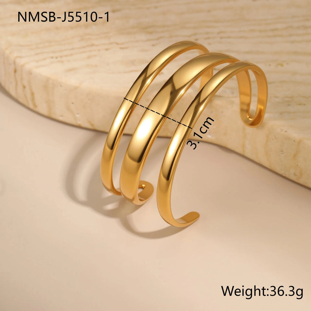 Geometric line stainless steel bracelet for women, showing gold electroplated and natural steel finish options