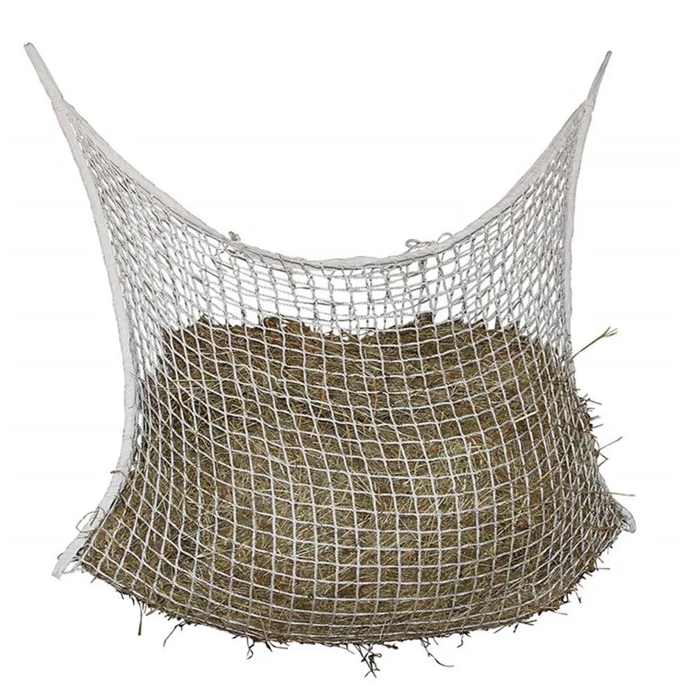 Woven grid horse feeding bag hanging with hay, shown in black colour
