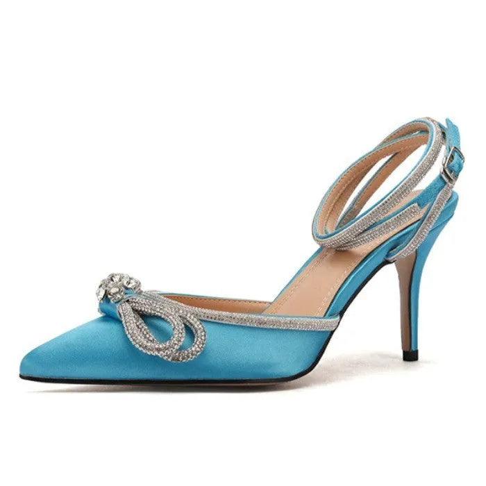 Women's stiletto heel sandals with a silk bandage back, buckle strap, and pointed toe in various colours.
