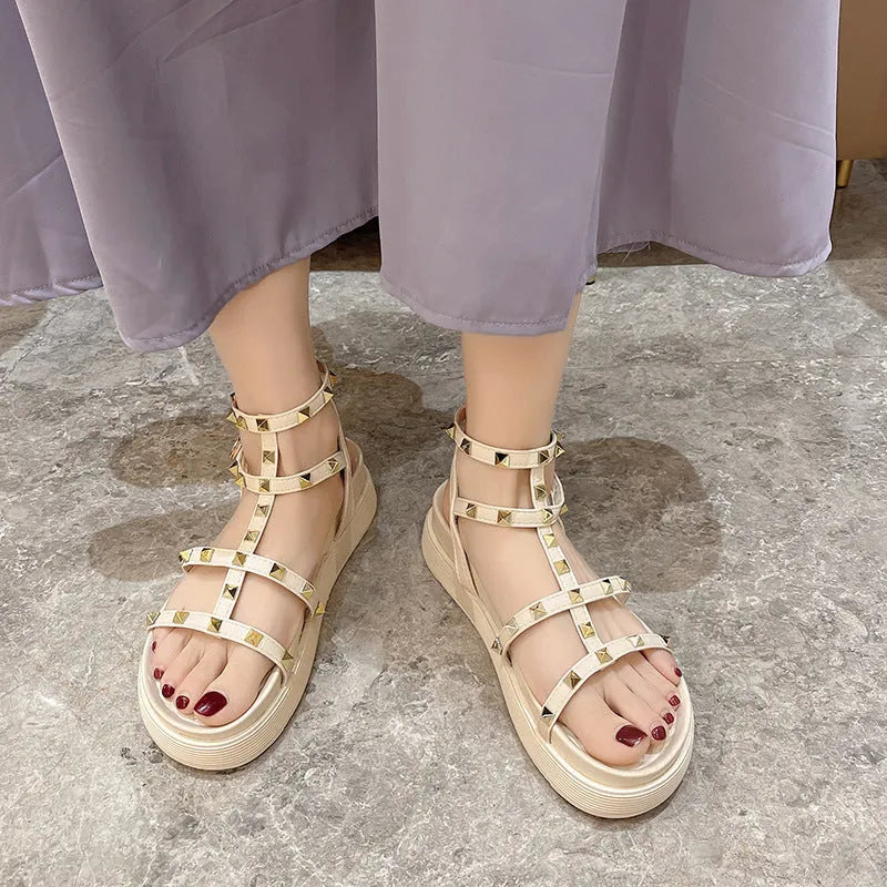 Beige Fairy Style Roman sandals for women with round toe, rivet platform, and ankle buckle closure.