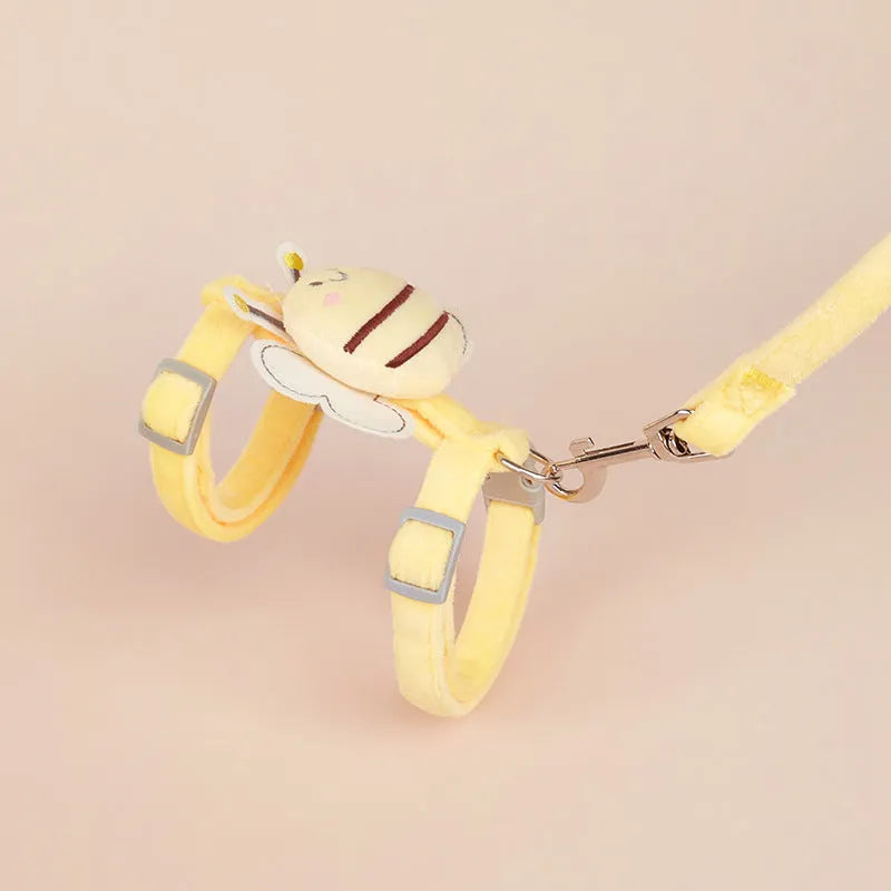 Bee-shaped pink cat harness and matching rope lead on a white background