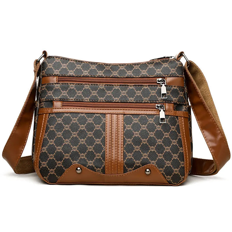 Women's large-capacity crossbody bag in brown or white with PU outer, polyester lining, and stitching pattern