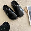 Flat buckle casual sneakers in yellow, creamy-white, silver, and black colours showing round toe and buckle detail.