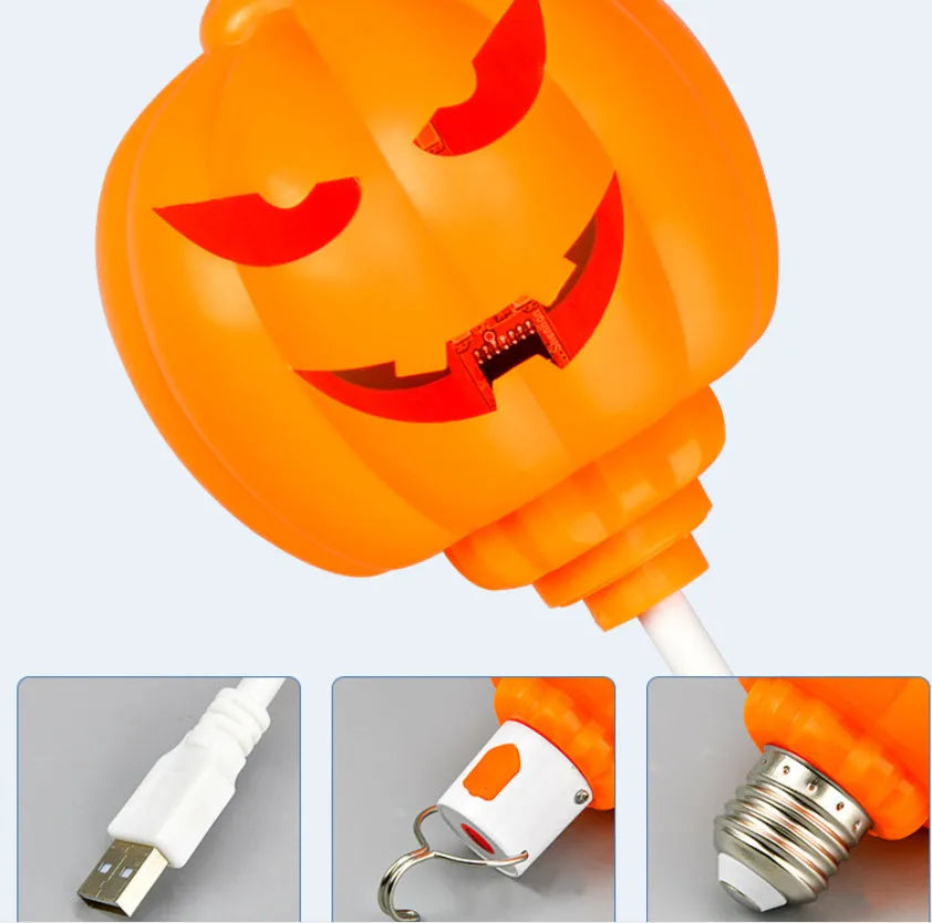 Plastic pumpkin lamp with USB cable showing yellow and purple light options