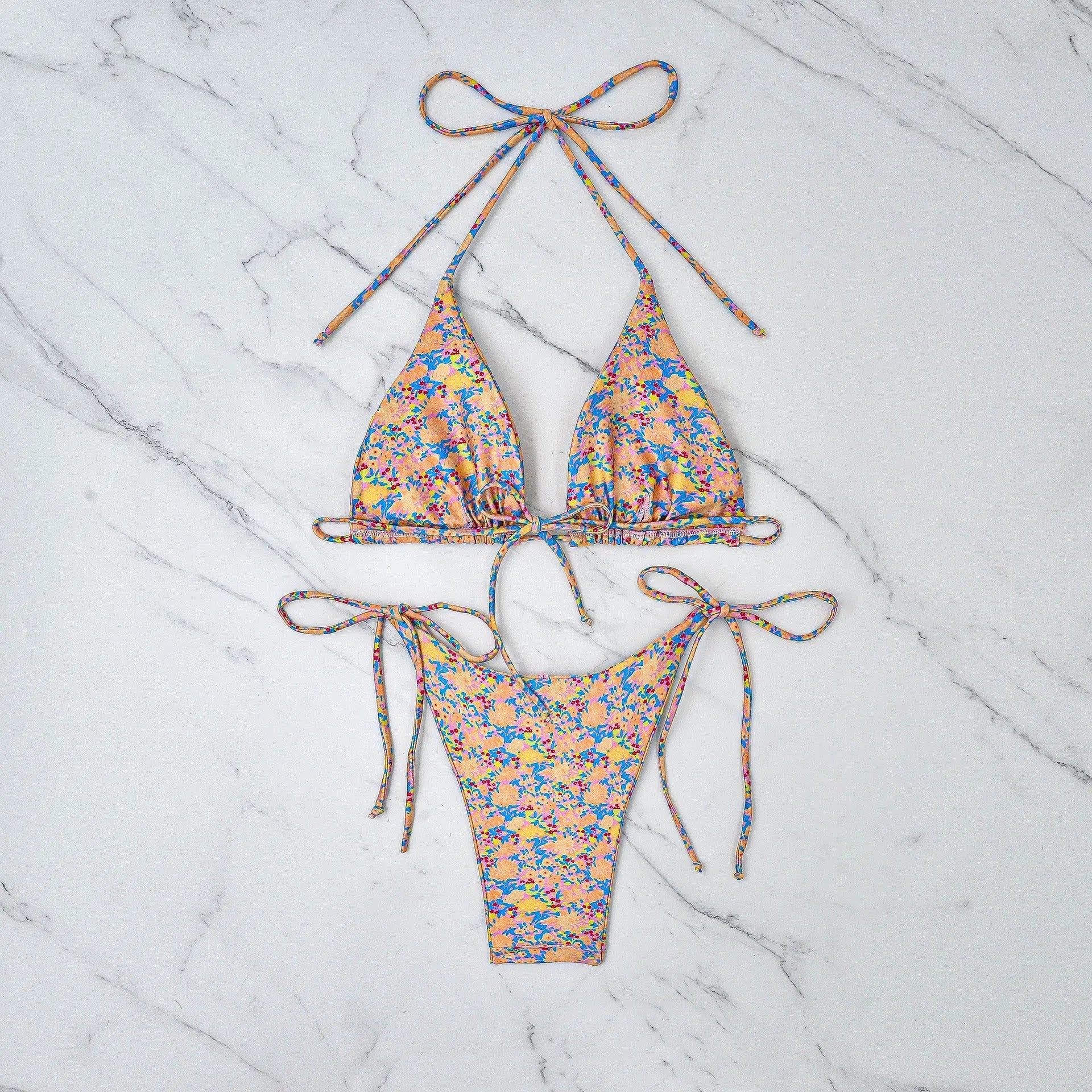 Lace-up bikini swimsuit set with sleeveless top and split briefs in polyester fabric
