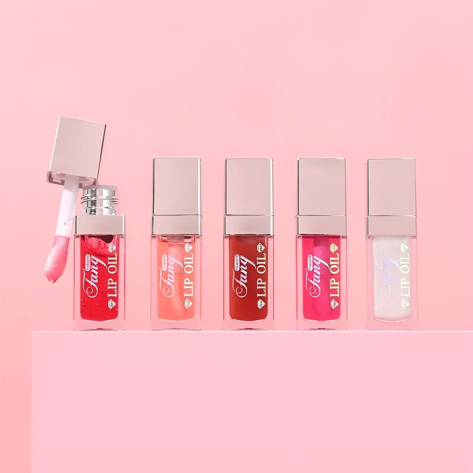 Five lip gloss and lipstick applicators in shades Style001, Style006, Style007, Style012, and Style015.