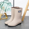 Women's mid-calf rain boots in black and brown with low heel and warm lining options