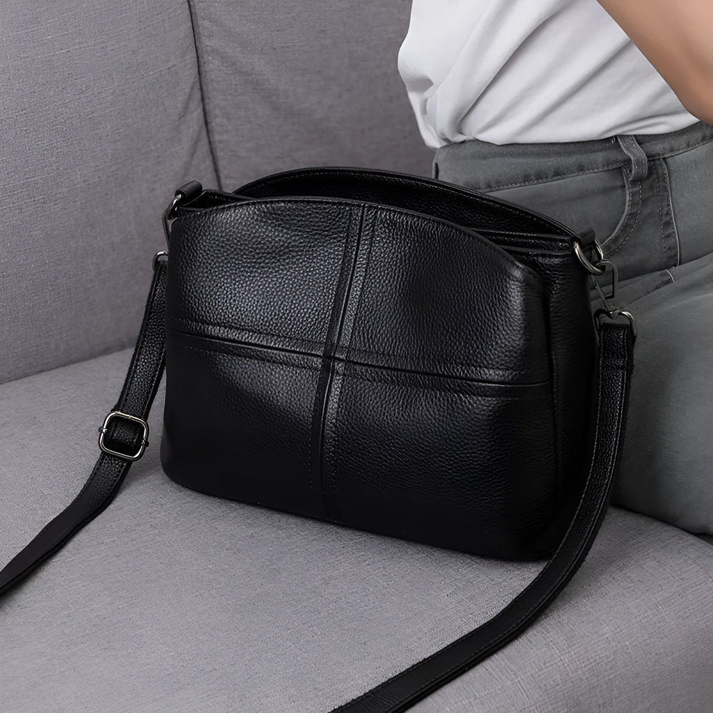 Genuine leather handbag with plaid pattern, single strap, horizontal square shape, medium soft.