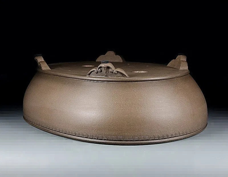 Handmade oval purple sand flowerpot with black mud design measuring 50x39.5x16cm