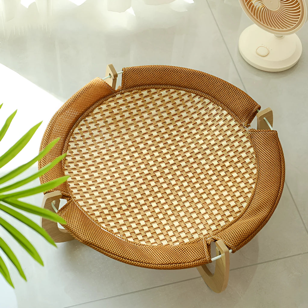 Brown woven rattan pet bed measuring 46x46cm with 17.5cm raised platform for cats and dogs