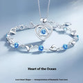 Blue diamond love heart necklace and bracelet jewellery set with mixed gem inlaid pendant