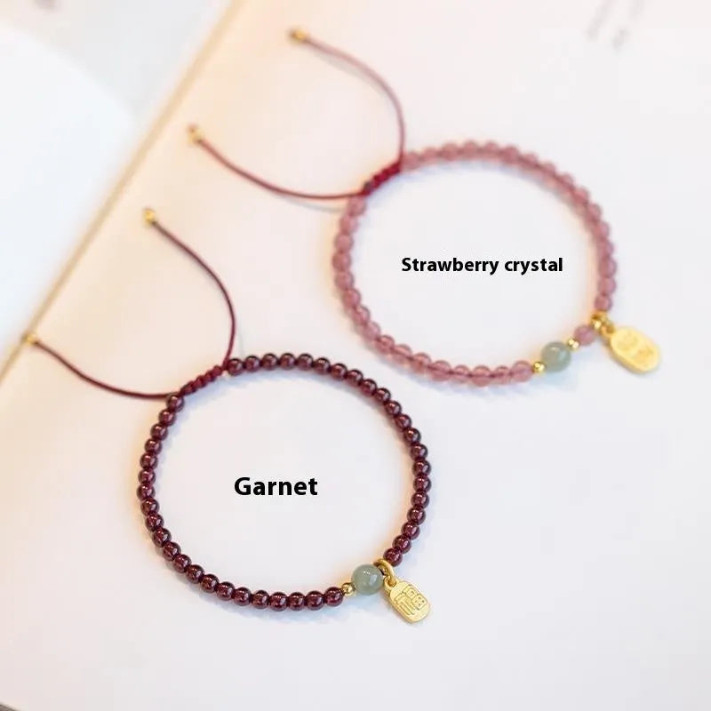 Red rope bracelet with strawberry quartz and garnet beads in hand-woven women's design