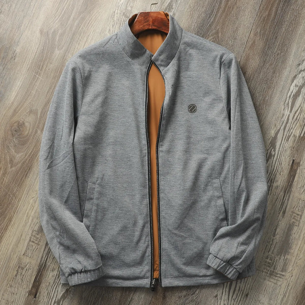 Men's plain stand collar jacket in a polyester cotton blend fabric, shown in blue.
