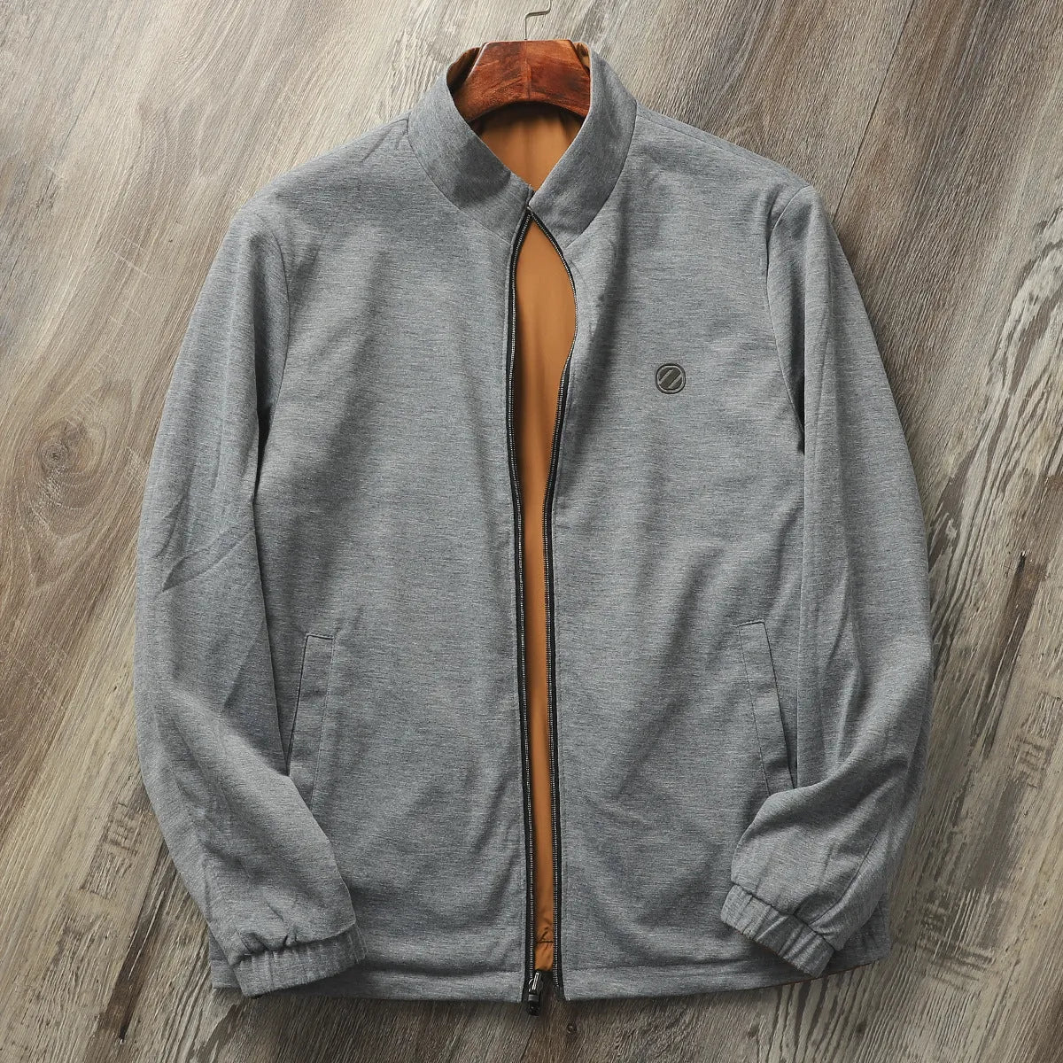 Men's plain stand collar jacket in a polyester cotton blend fabric, shown in blue.