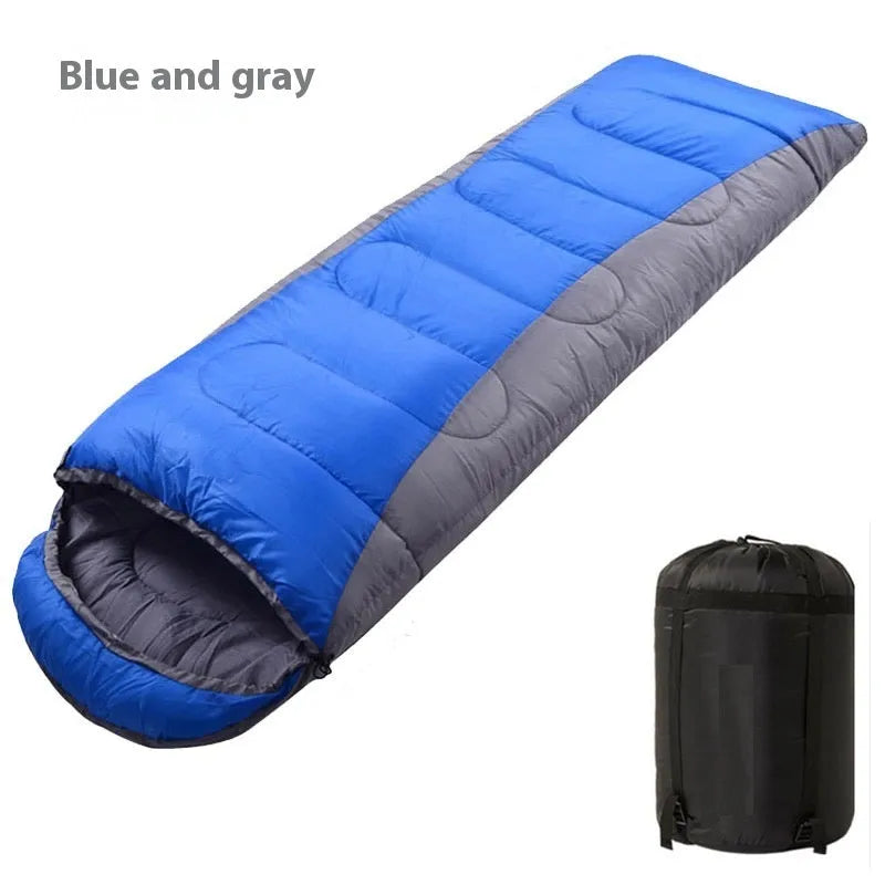 Envelope sleeping bag in orange and gray colour for camping and outdoor travel