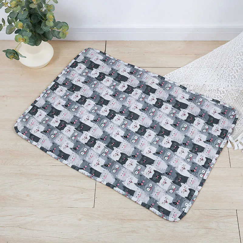 Reusable washable waterproof pet urine pad with animal print designs in multiple sizes