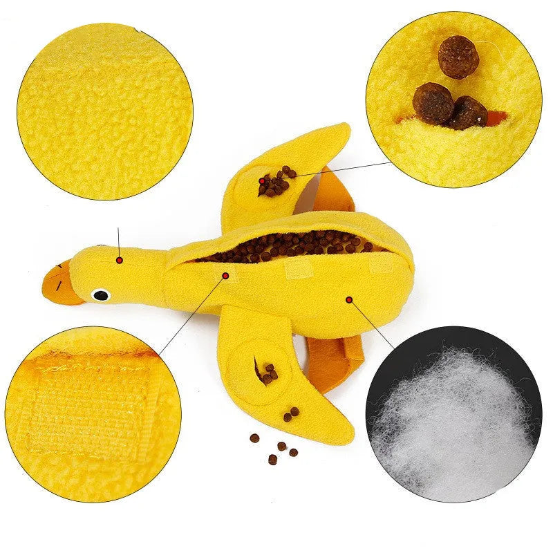 Yellow teddy duck dog toy with food leak openings and squeaker for training and chewing