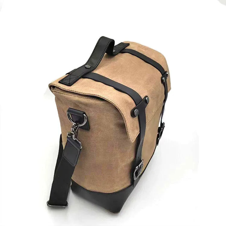 Universal waterproof canvas motorcycle side pannier pack with leather reinforcement in black colour