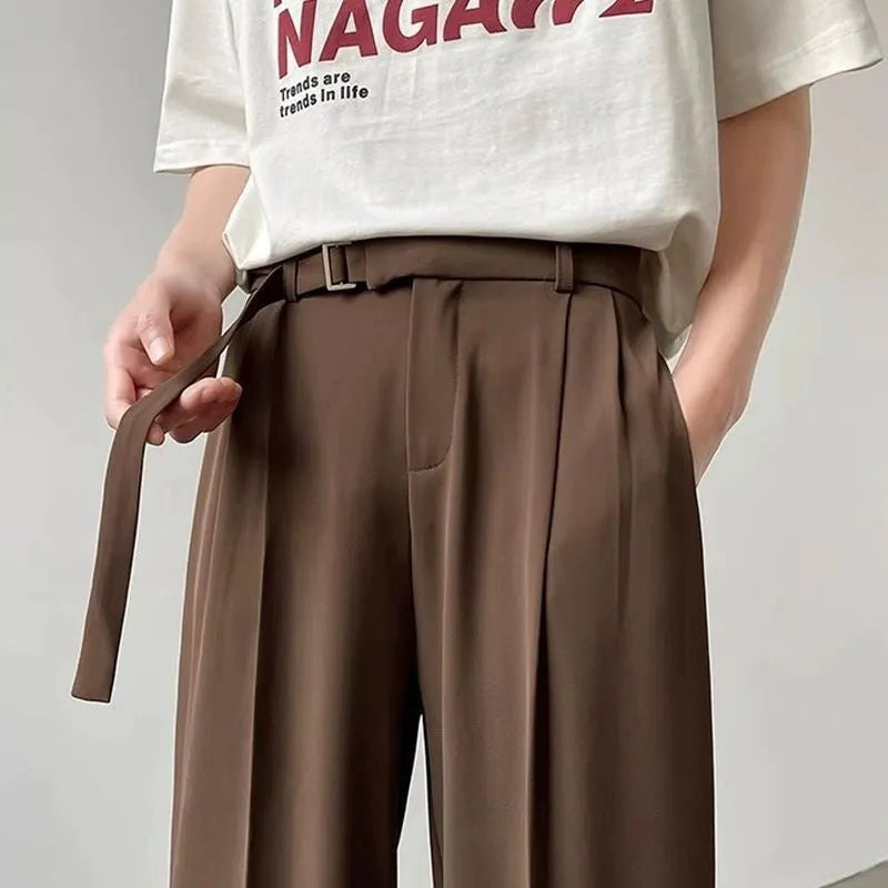 Thin straight black wide leg trousers with loose fit and straight leg opening