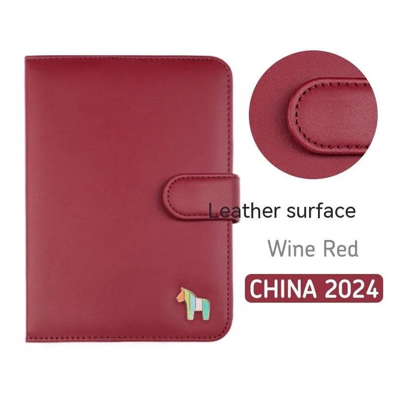 Leather bound schedule book open showing daily planner pages, 164mm by 120mm size.