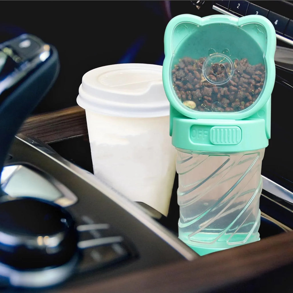 Green pink and white 3-in-1 portable pet water bottle with food container and waste bag dispenser