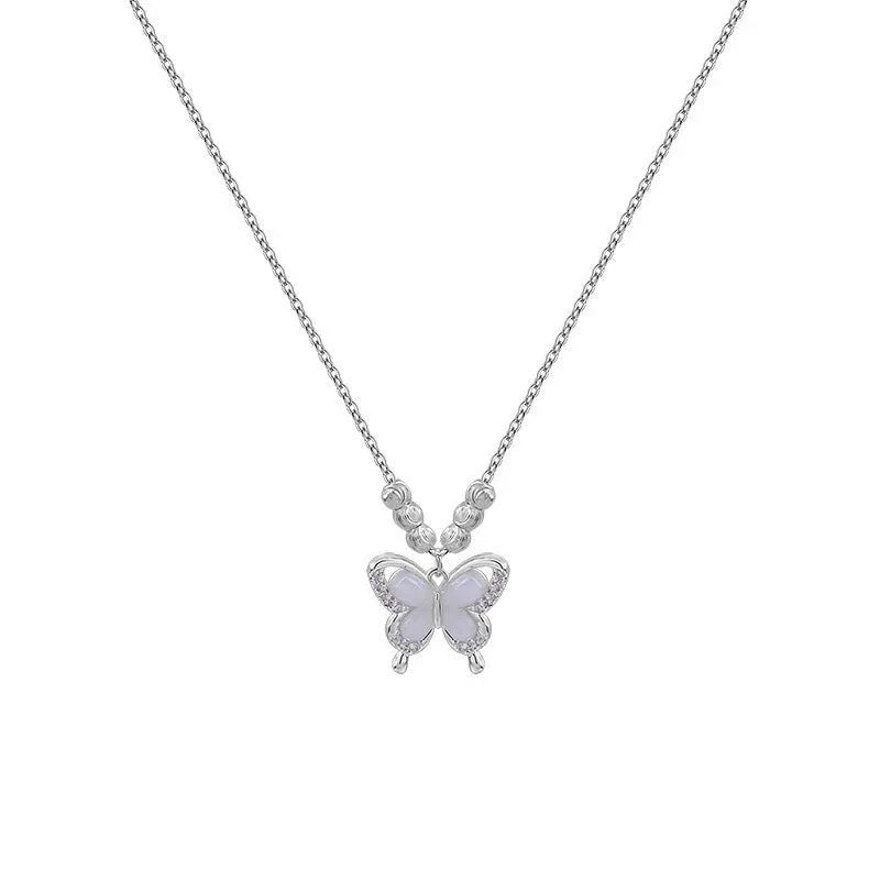 Silver butterfly necklace with square line opal detail on cross chain